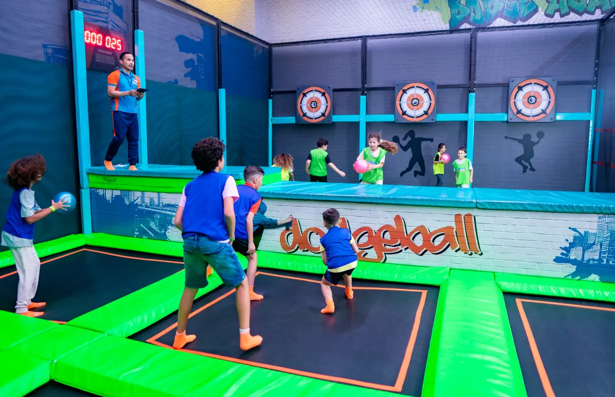 Players dodging and throwing on bouncy courts