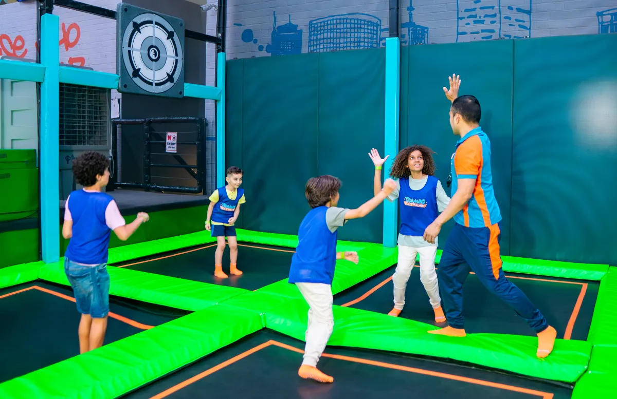 Group dodgeball match at Trampo