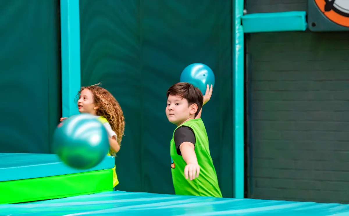 Dodgeball action on the trampoline court