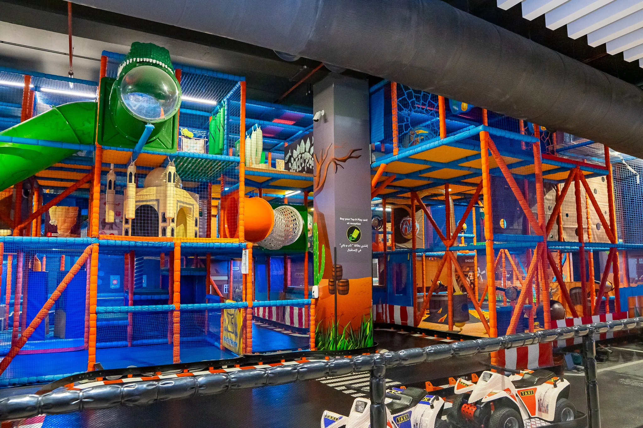 Slides and tunnels inside the soft play structure