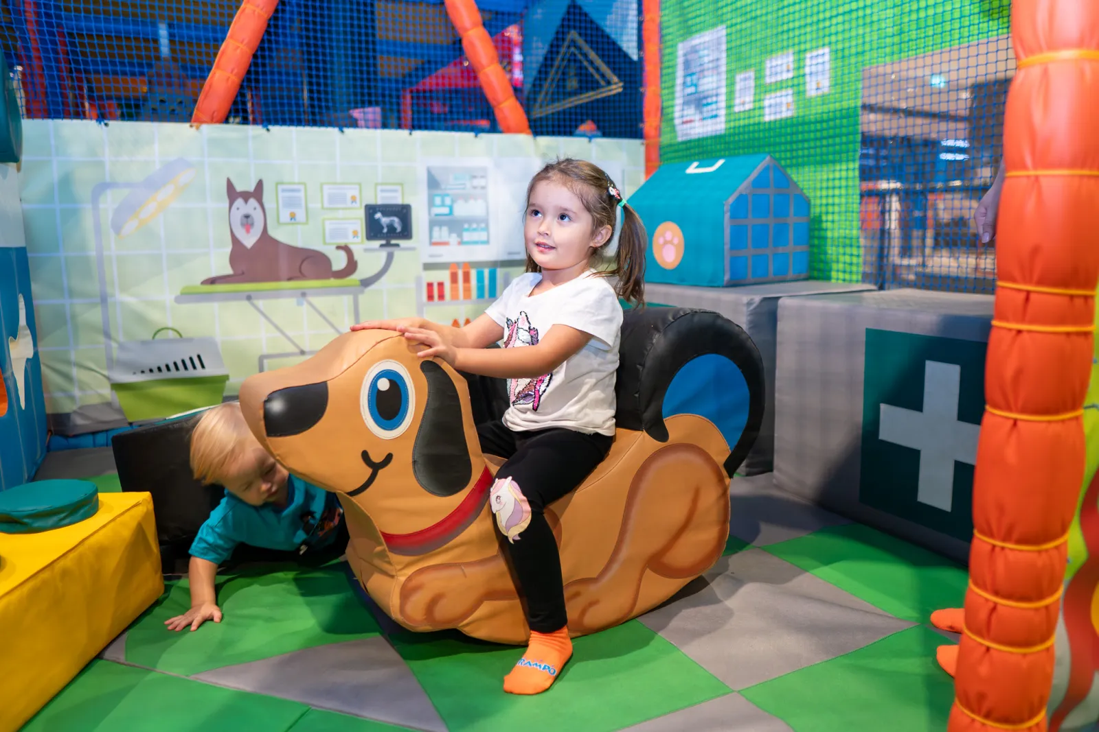 Kids playing in the soft play zone at Trampo