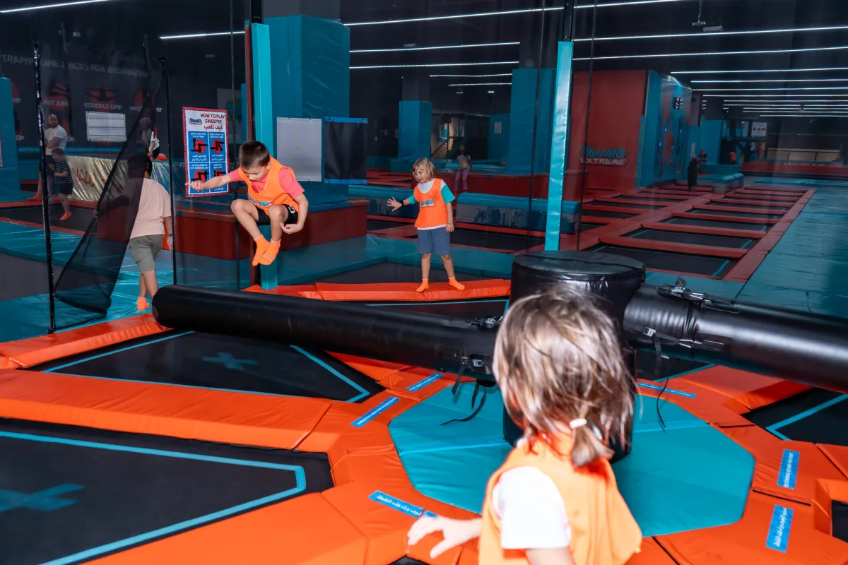 Group playing sweeper at Trampo