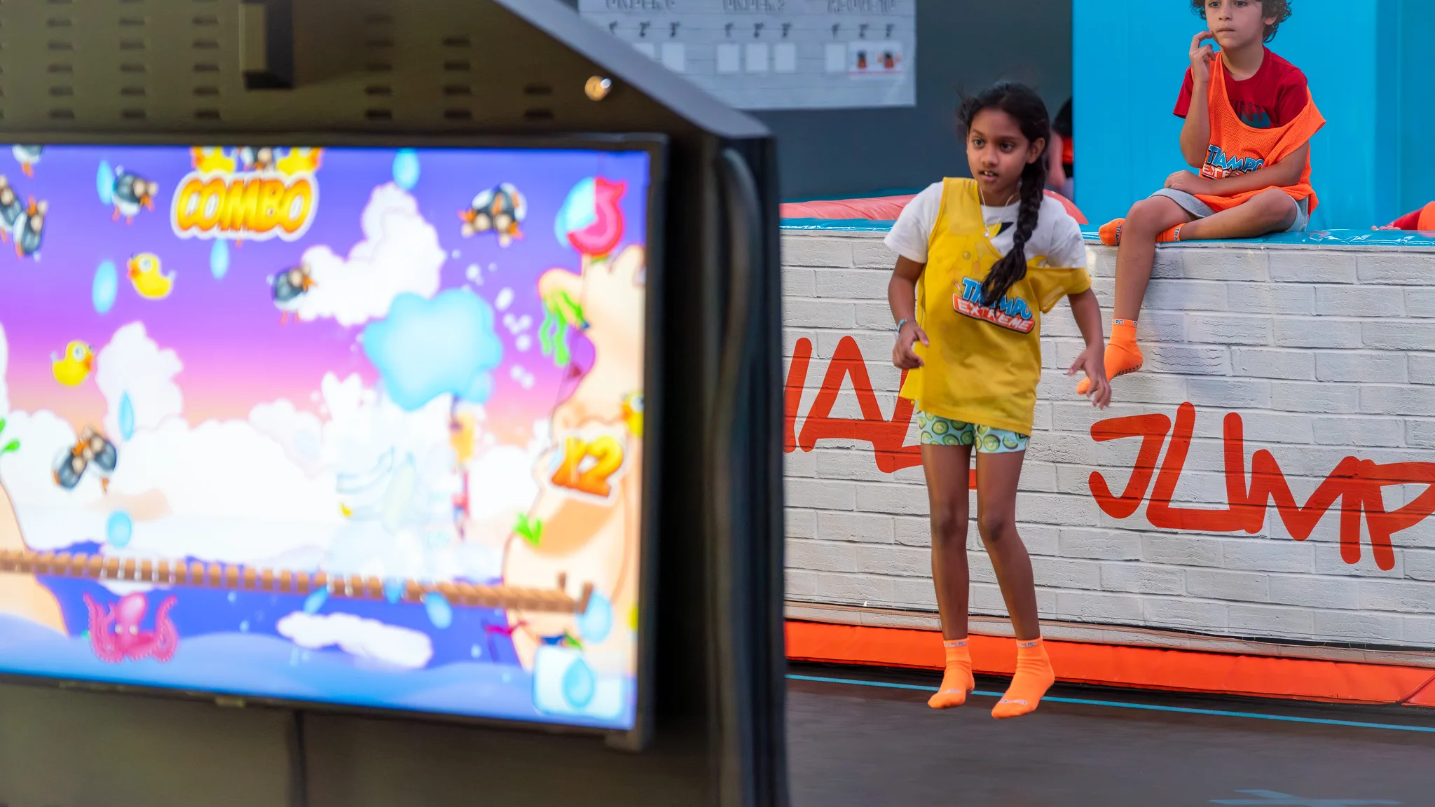 Player mid-jump hitting targets on Valo Jump