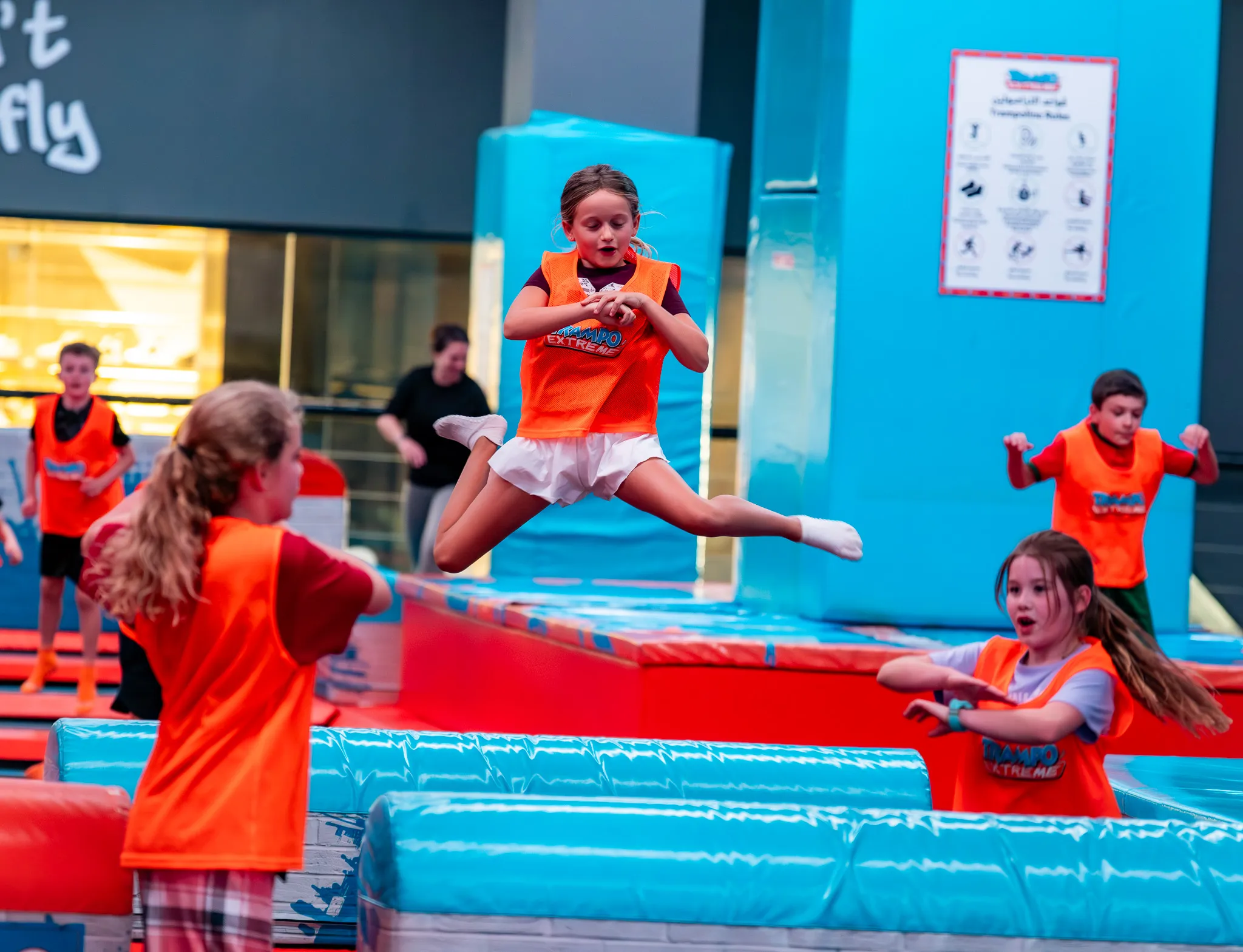 Girl mid-air on trampoline